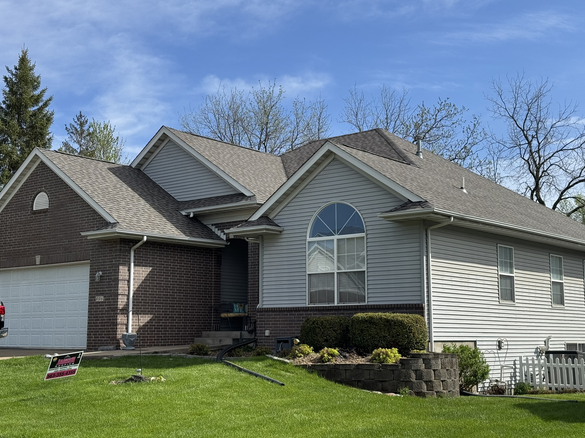 beautiful house white siding new shingles roof